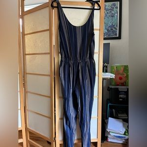 Known supply. Navy and beige jumpsuit. Medium